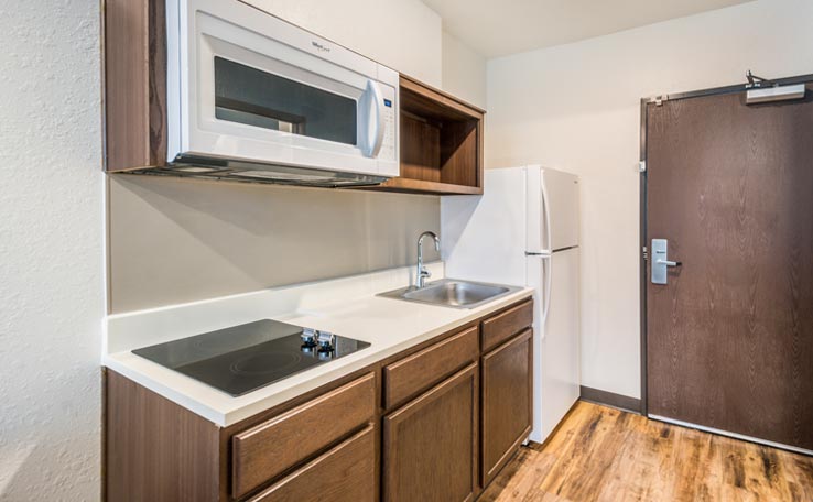 Non-Smoking Queen Bed Suite with Sofa at WoodSpring Suites Bradenton