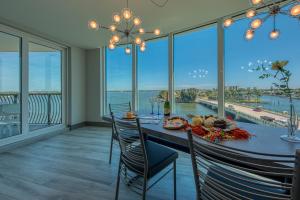 Three-Bedroom Suite with Balcony and Full Water View at FUSION Resort Waterfront Suites